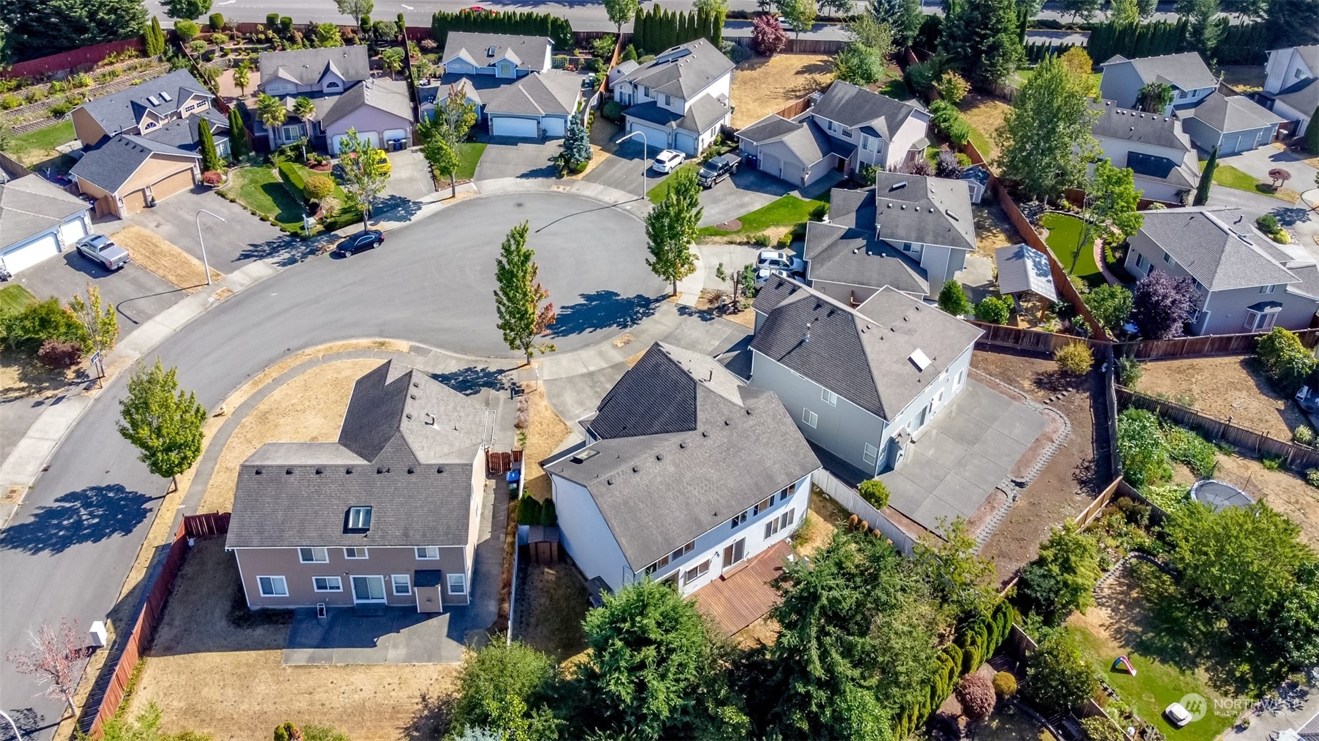 4609 Northeast 7th Place Renton, WA 98059 - Photo 27 of 30 an aerial view of multiple houses with outdoor space