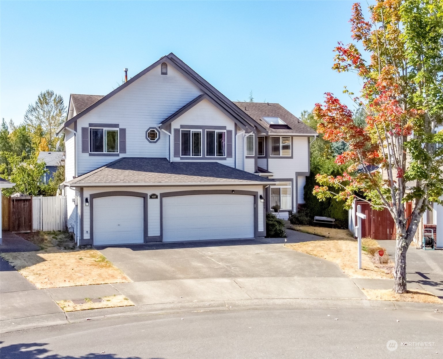 4609 Northeast 7th Place Renton, WA 98059 - Photo 30 of 30 a front view of a house with a yard