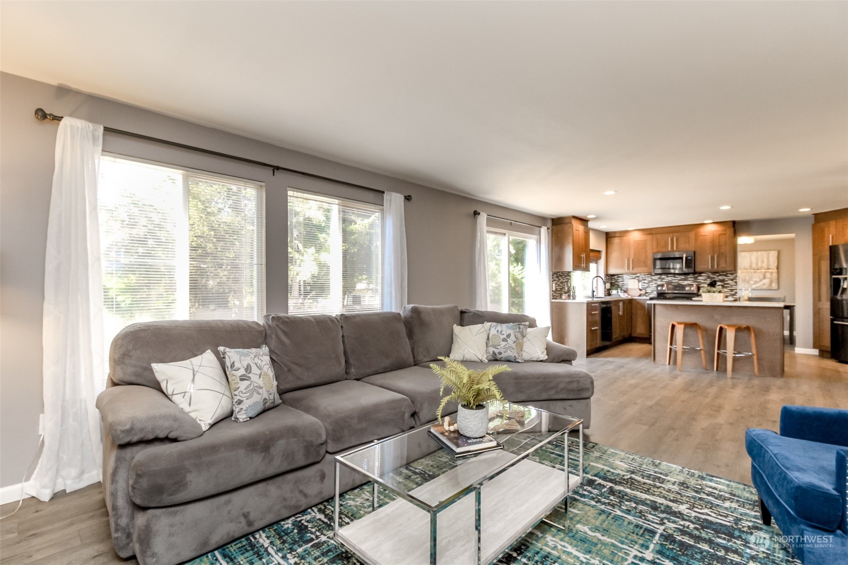 4609 Northeast 7th Place Renton, WA 98059 - Photo 7 of 30 a living room with furniture and a large window