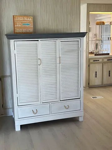 a view of a door and a cabinet