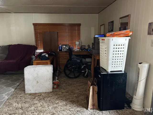 a kitchen with a stove and cabinets