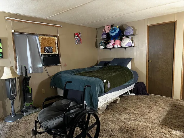 a outdoor dining space with furniture and window