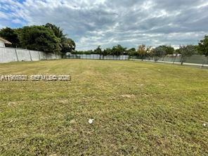 30321 Southwest 149th Avenue Homestead, FL 33033 - Photo 2 of 5 a view of a swimming pool and an outdoor seating