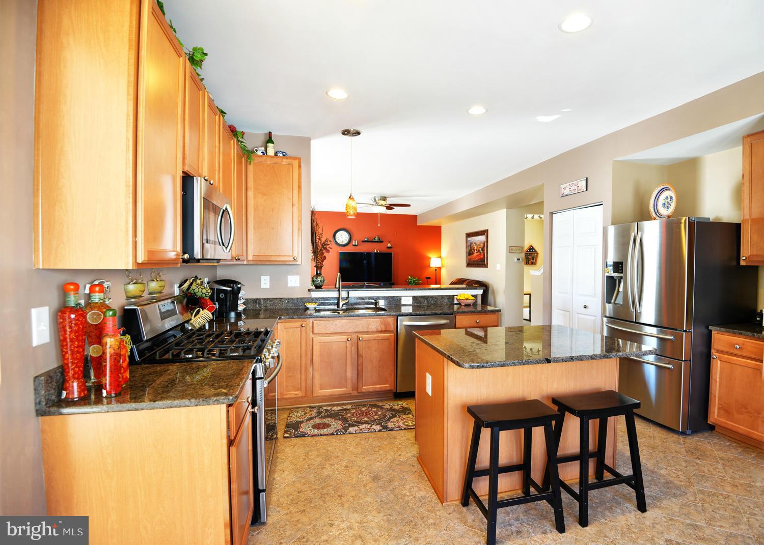 1197 Bradley Road Severn, MD 21144 - Photo 10 of 30 Breakfast bar and kitchen island