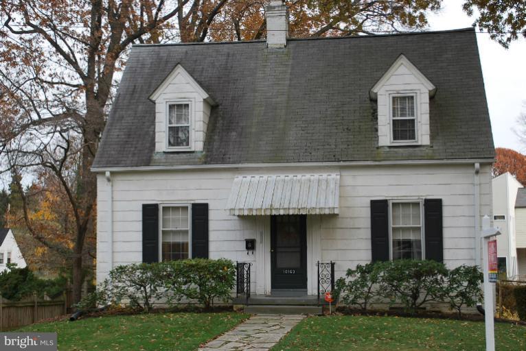 10163 Sutherland Road Silver Spring, MD 20901 - Photo 1 of 28 front view of a house with a yard