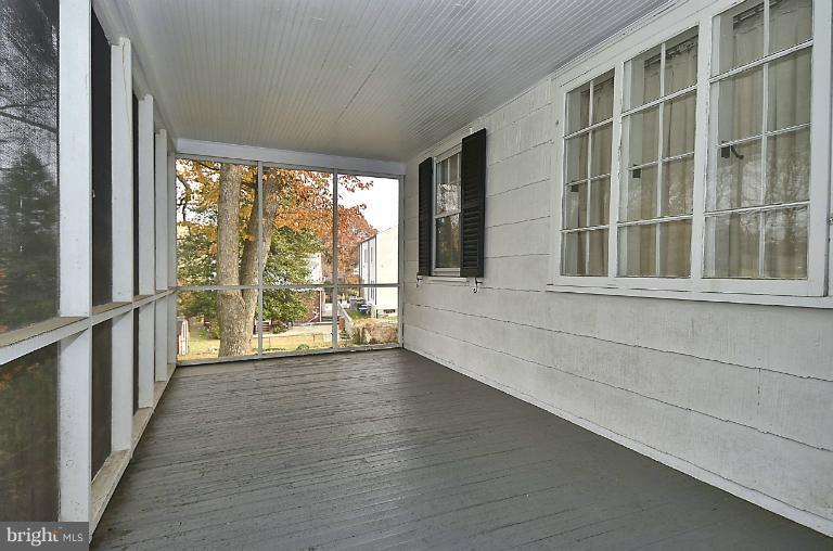 10163 Sutherland Road Silver Spring, MD 20901 - Photo 14 of 28 a view of an entryway with wooden floor