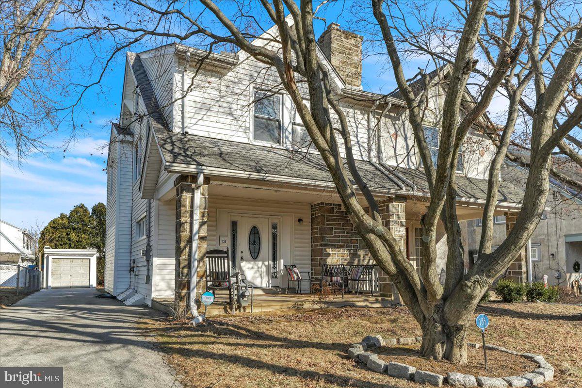 135 Sycamore Road Havertown, PA 19083 - Photo 1 of 33 front view of a house with a trees