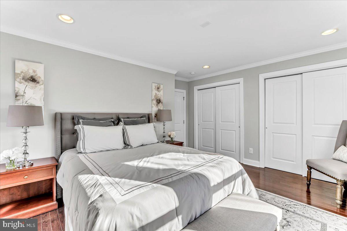 135 Sycamore Road Havertown, PA 19083 - Photo 13 of 33 a bedroom with a bed and chair