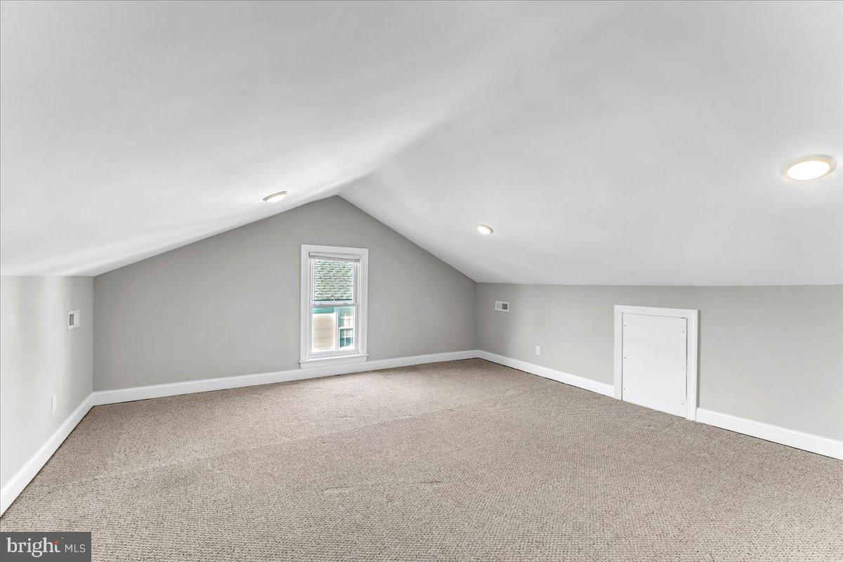 135 Sycamore Road Havertown, PA 19083 - Photo 18 of 33 a view of an empty room with a window