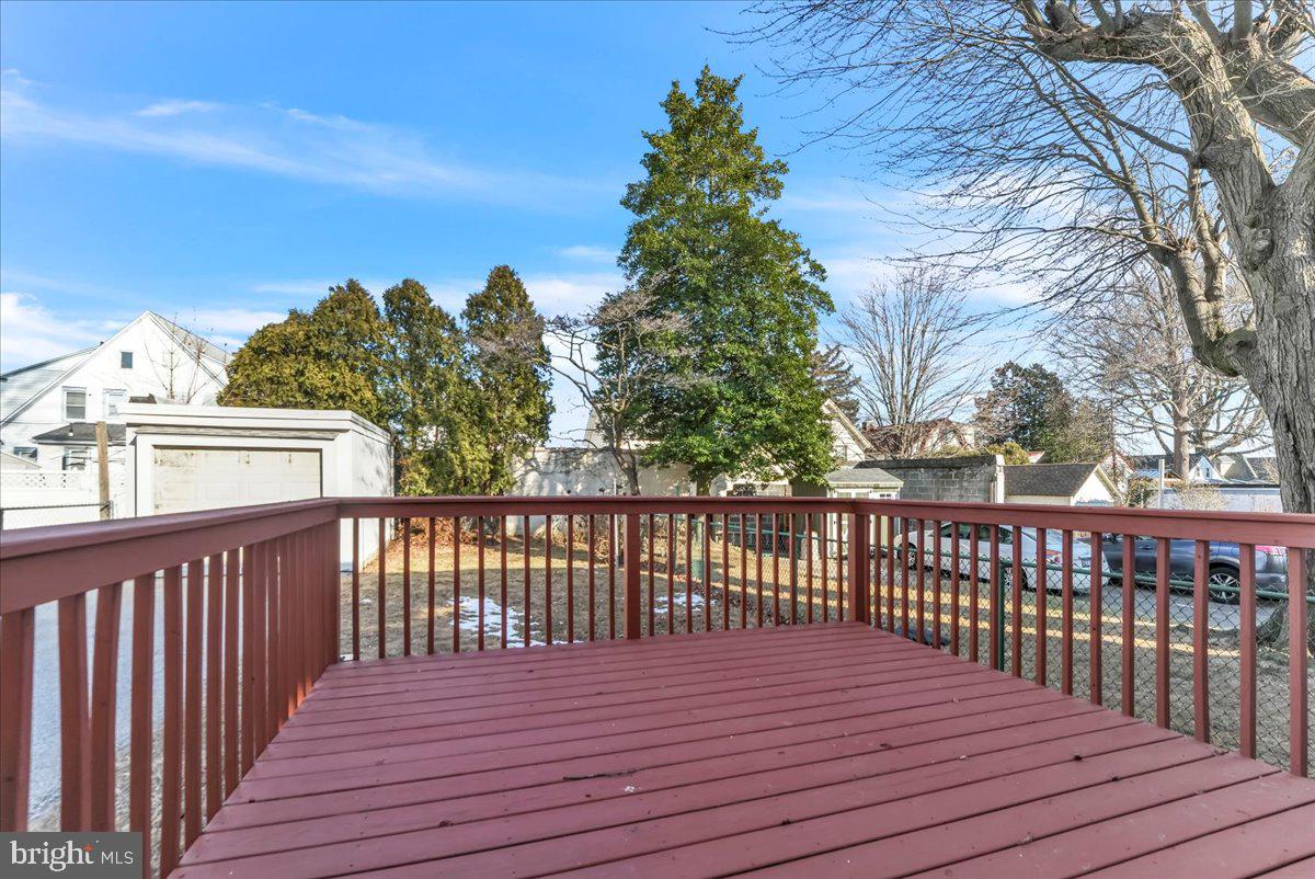 135 Sycamore Road Havertown, PA 19083 - Photo 21 of 33 a view of wooden deck and a backyard