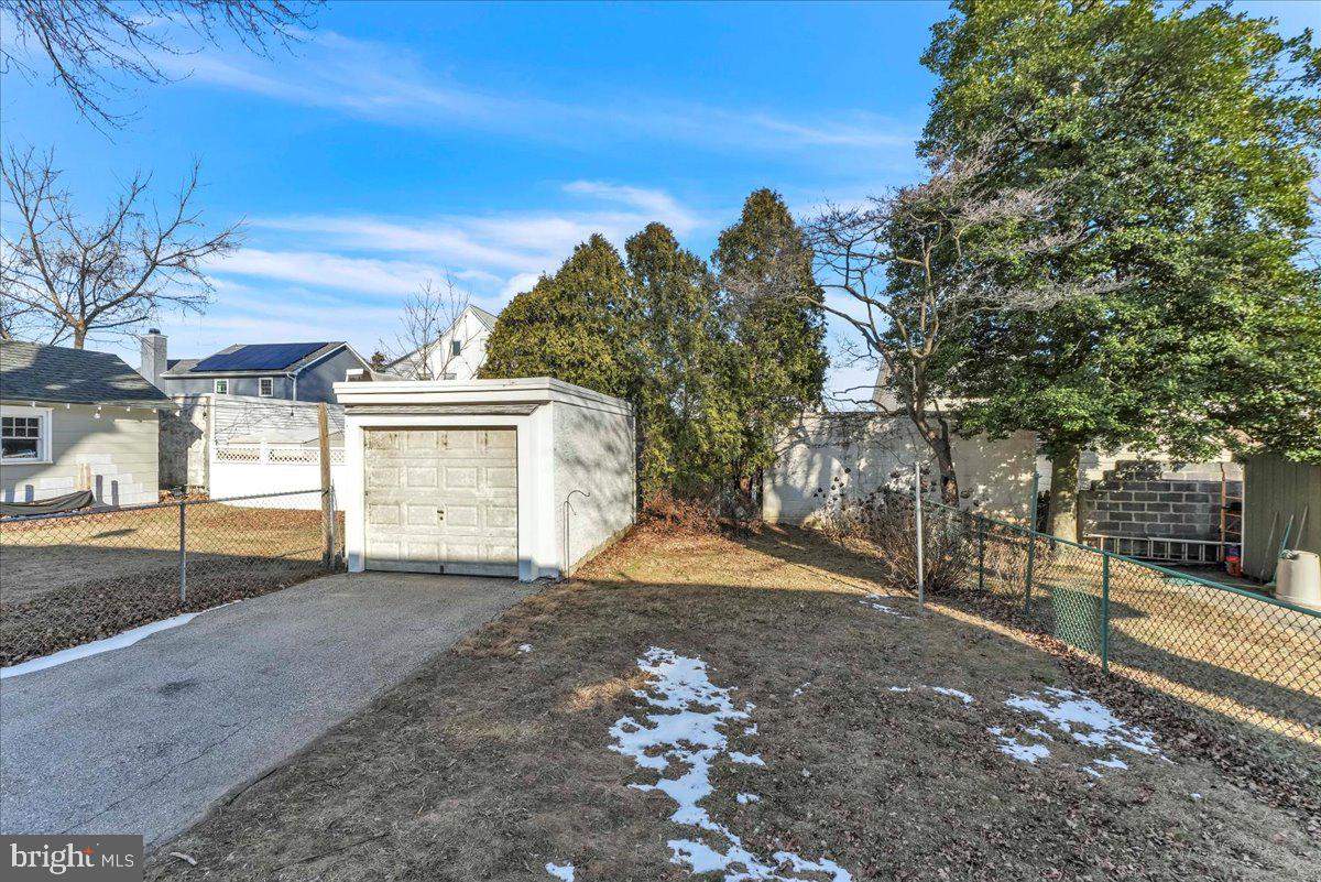135 Sycamore Road Havertown, PA 19083 - Photo 24 of 33 a view of a house with a snow in the yard