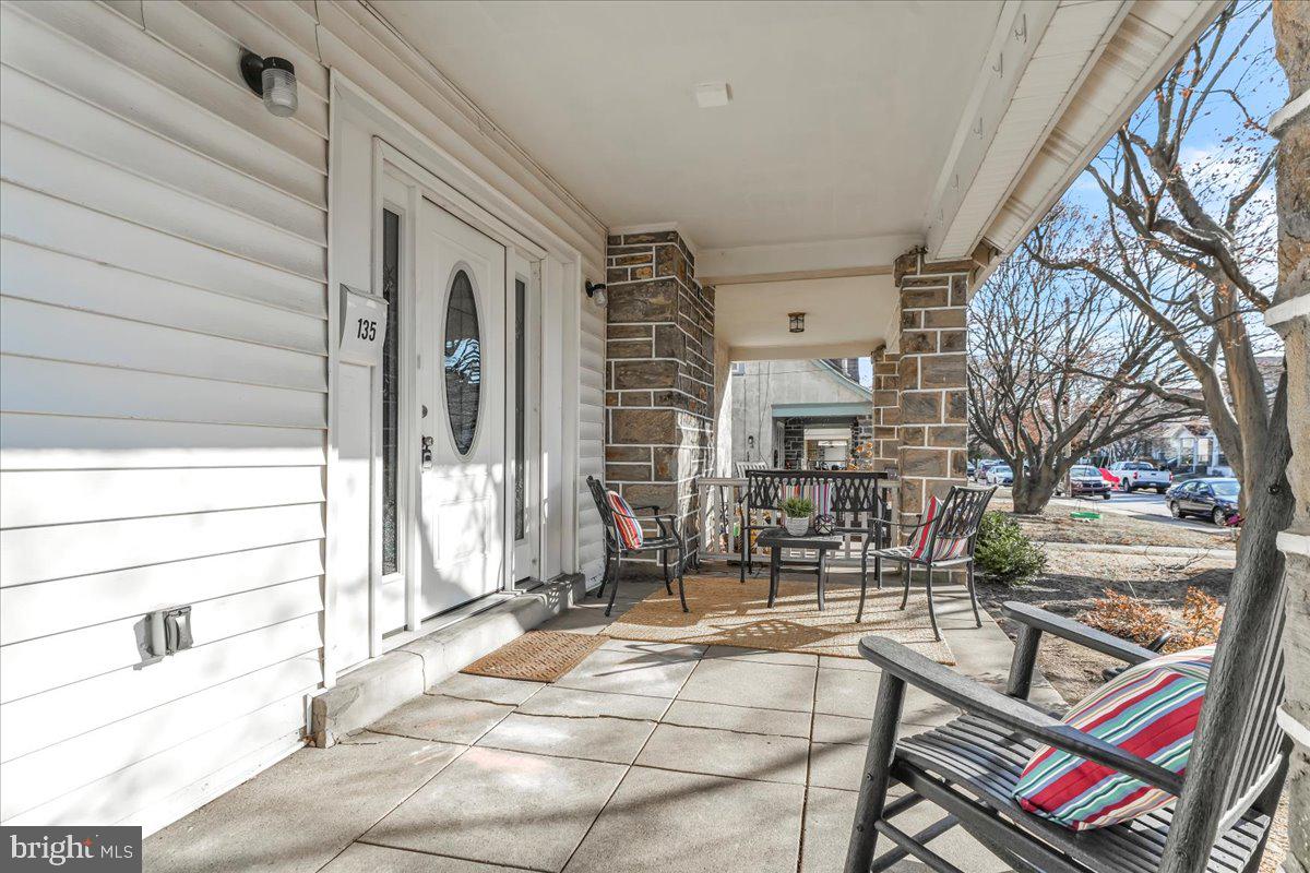 135 Sycamore Road Havertown, PA 19083 - Photo 27 of 33 a building outdoor space with patio furniture and potted plants