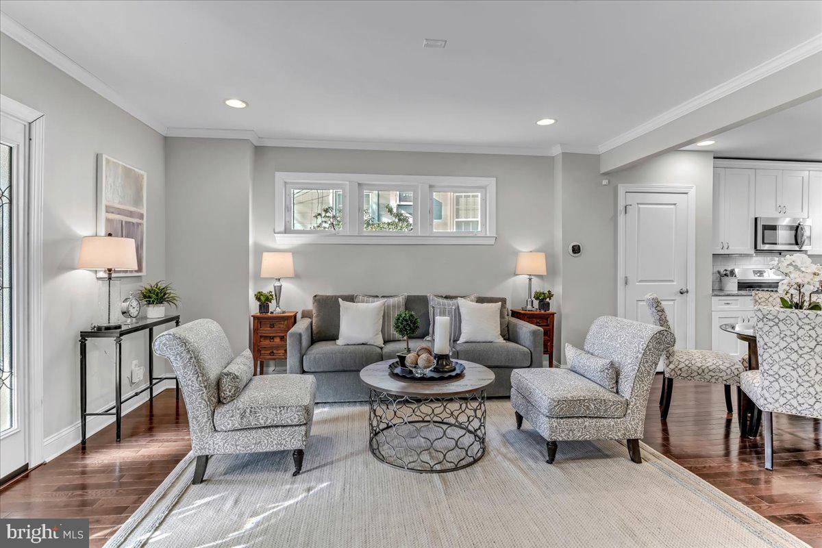 135 Sycamore Road Havertown, PA 19083 - Photo 3 of 33 a living room with furniture and a lamp