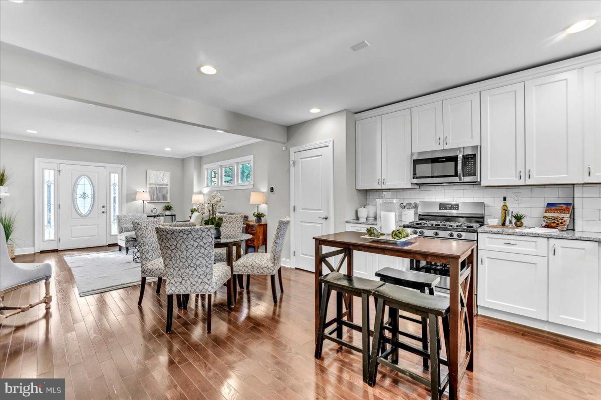 135 Sycamore Road Havertown, PA 19083 - Photo 10 of 33 a view of kitchen with cabinets table and chairs