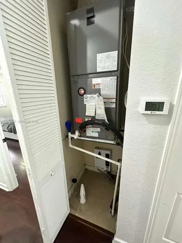 a bathroom with a toilet and a sink