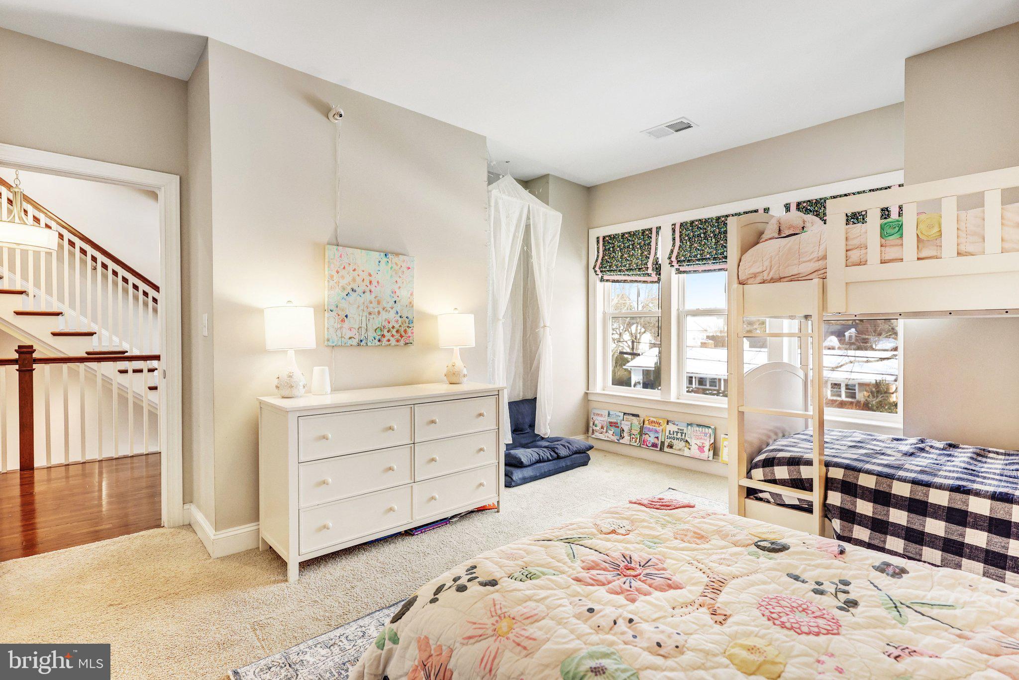 8028 Wellington Road Alexandria, VA 22308 - Photo 21 of 48 a bed room with a bed and a window