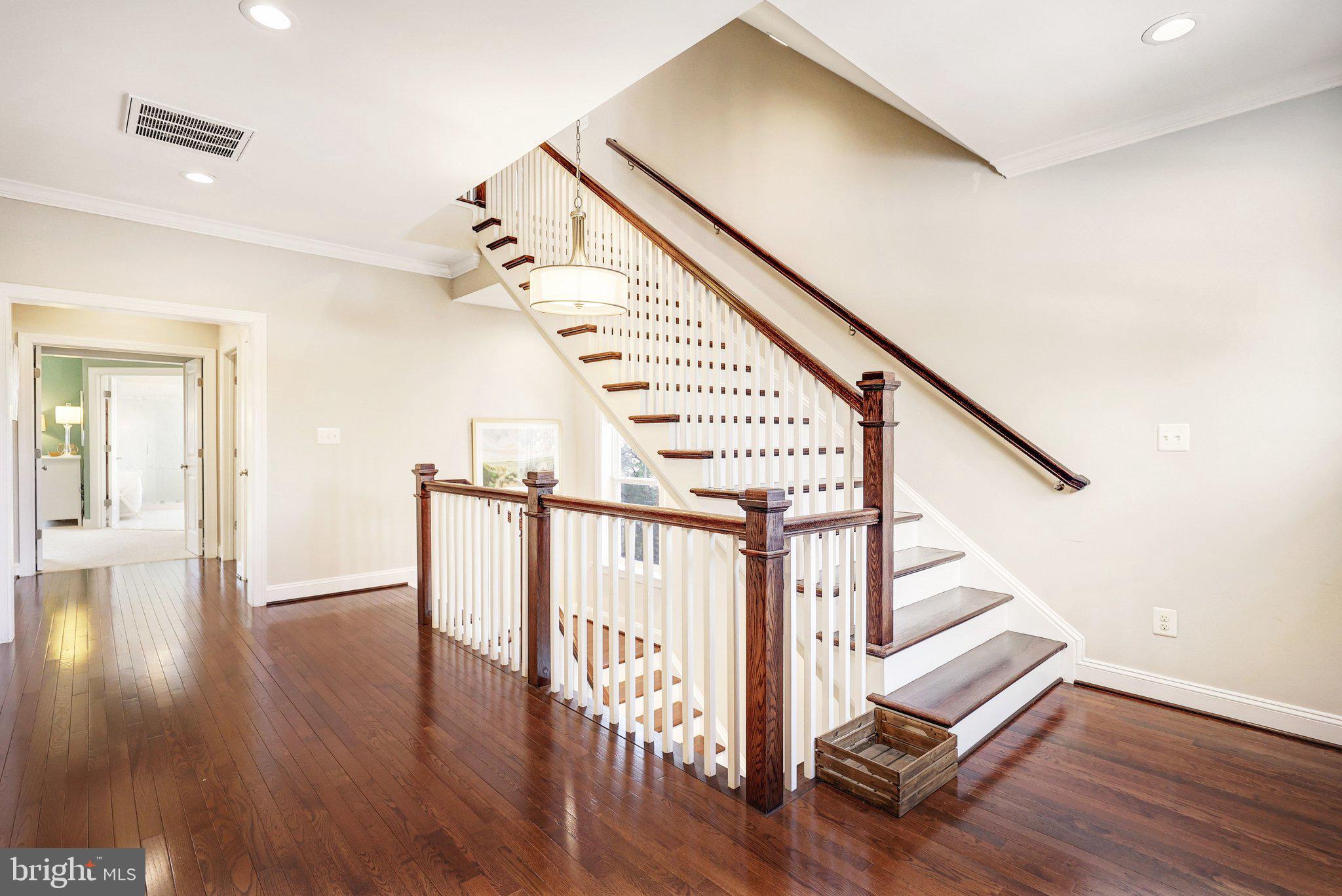 8028 Wellington Road Alexandria, VA 22308 - Photo 29 of 43 a view of entryway with wooden floor