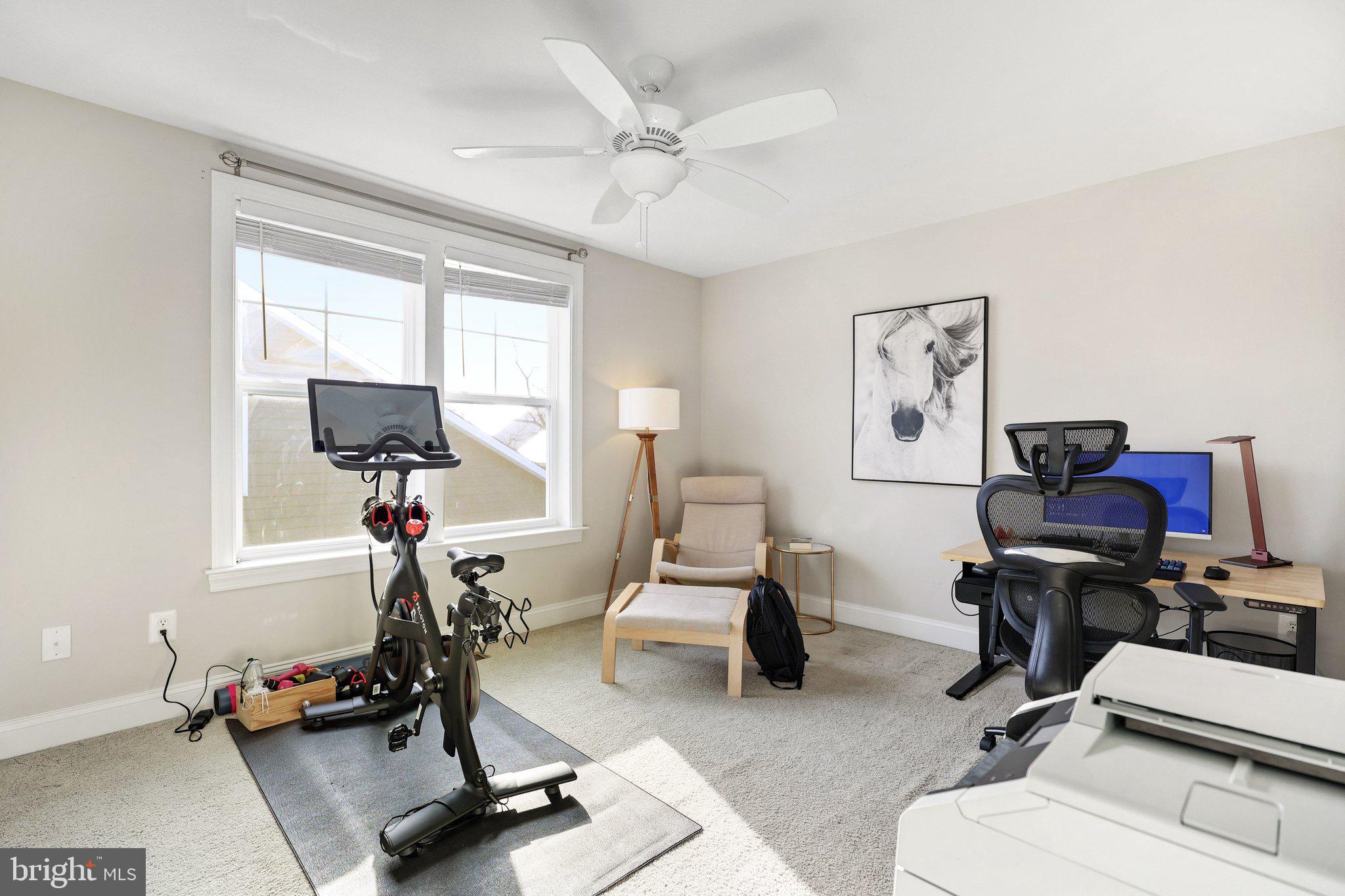 8028 Wellington Road Alexandria, VA 22308 - Photo 32 of 43 a view of a workspace with furniture and a window