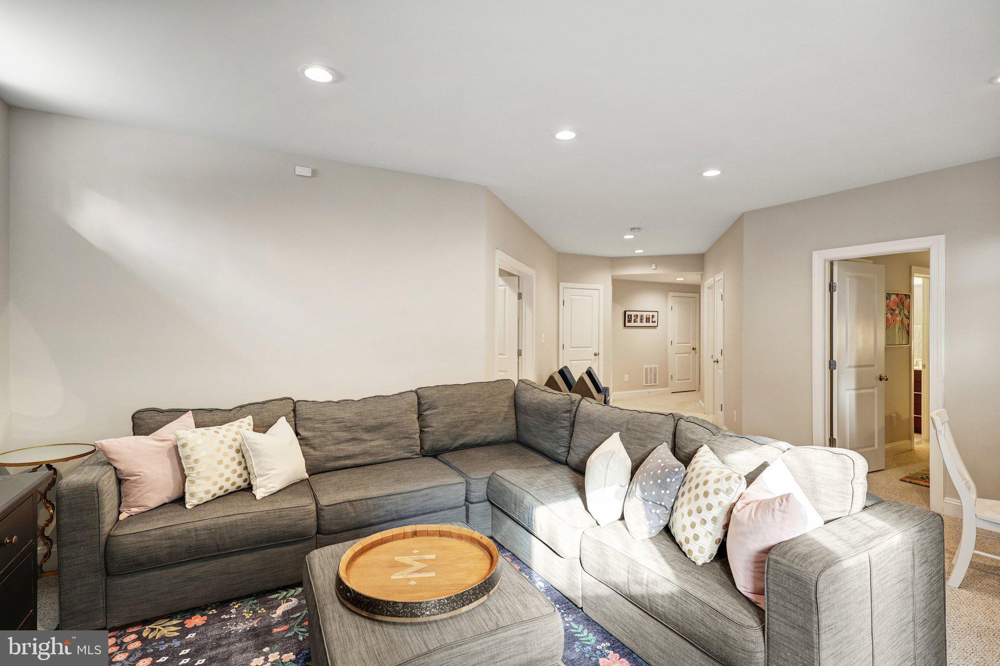 8028 Wellington Road Alexandria, VA 22308 - Photo 36 of 43 a living room with furniture and a couch