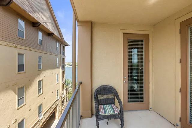 a view of swimming pool with outdoor seating