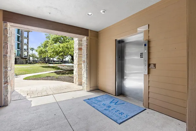 a view of an entryway with a rug