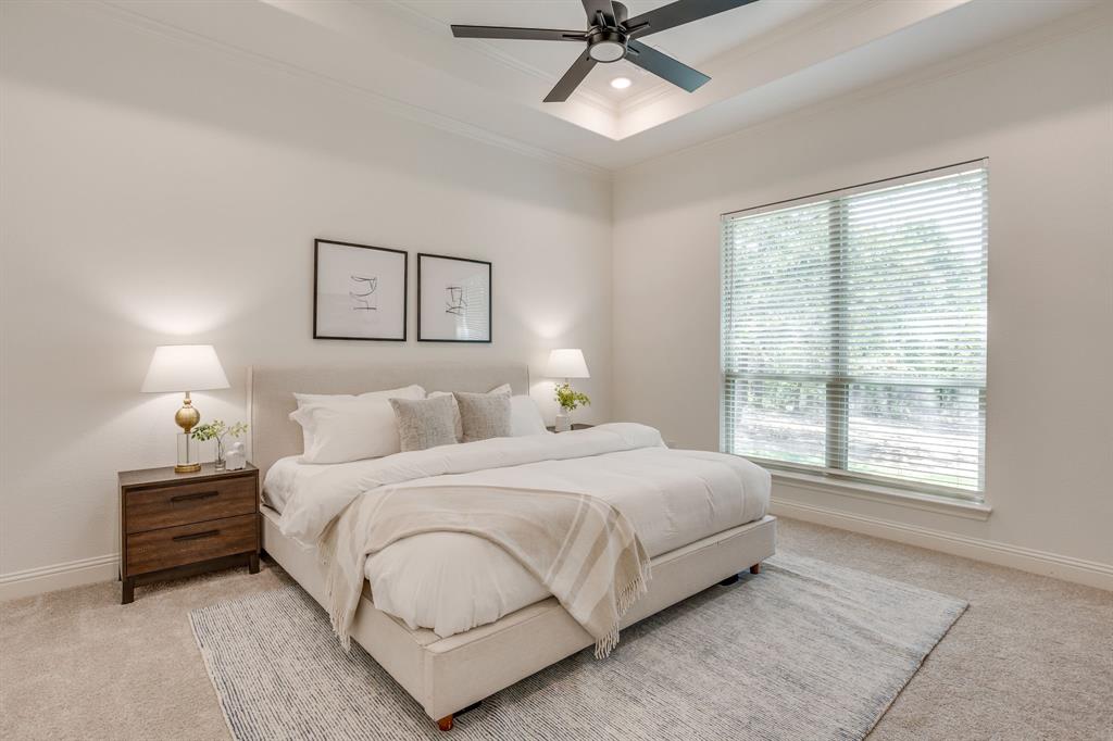 608 Tay Tay Way Springtown, TX 76082 - Photo 20 of 40 Tray ceiling with recessed lighting, ceiling fan, large window with blinds, and carpeted flooring