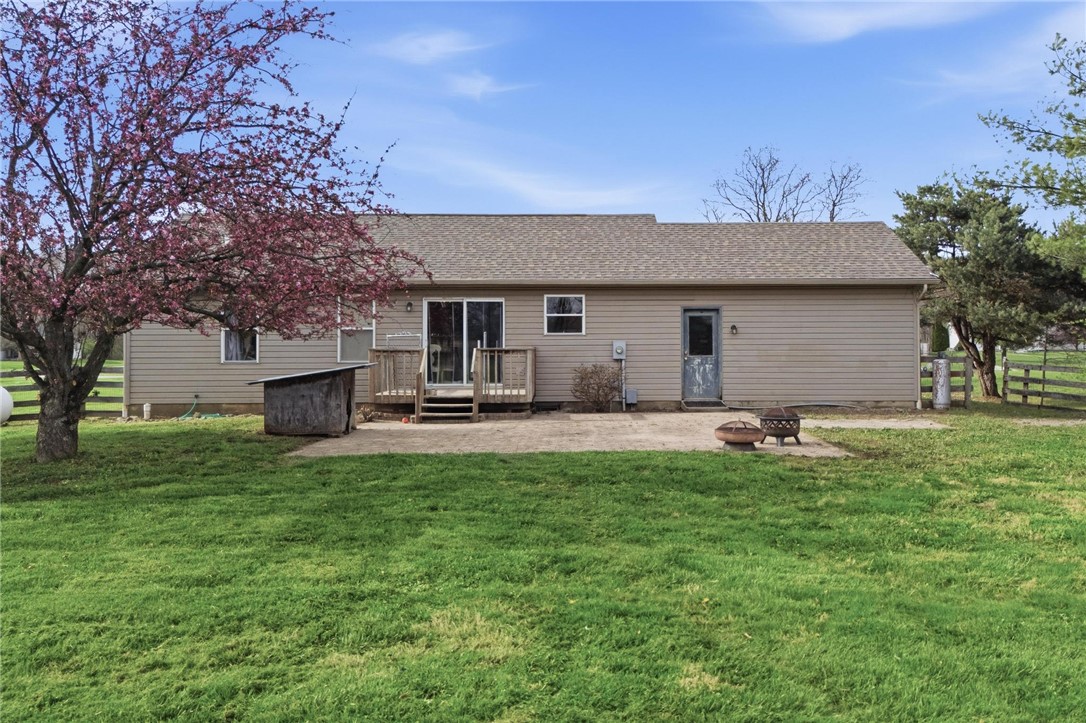 8747 Waynes Way Blanchester, OH 45107 - Photo 33 of 40 This residence features a patio for outdoor enjoyment, complemented by a vibrant tree.