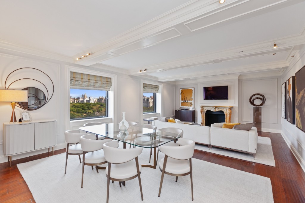 160 Central Park South, Unit 1201 Manhattan, NY 10019 - Photo 4 of 20 a living room with fireplace furniture and a wooden floor