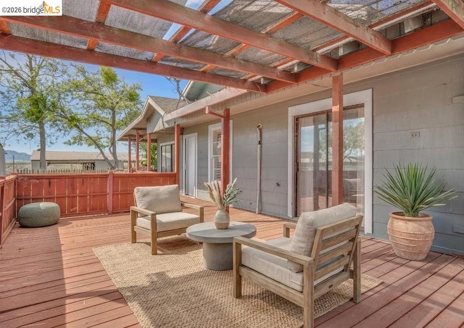 1922 Taylor Road Bethel Island, CA 94511 - Photo 33 of 49 a living room with patio furniture and a potted plant