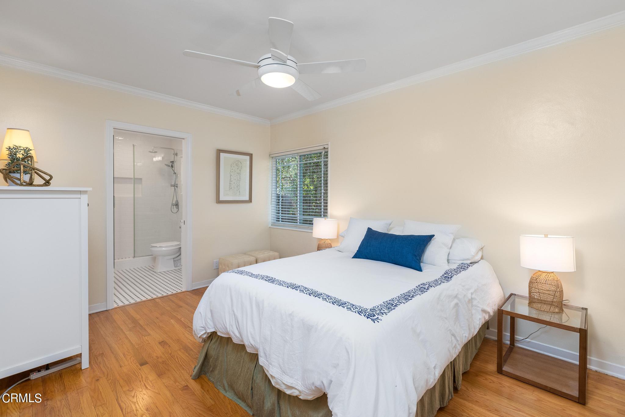 2399 Brigden Road Pasadena, CA 91104 - Photo 12 of 32 a bedroom with a bed and wooden floor