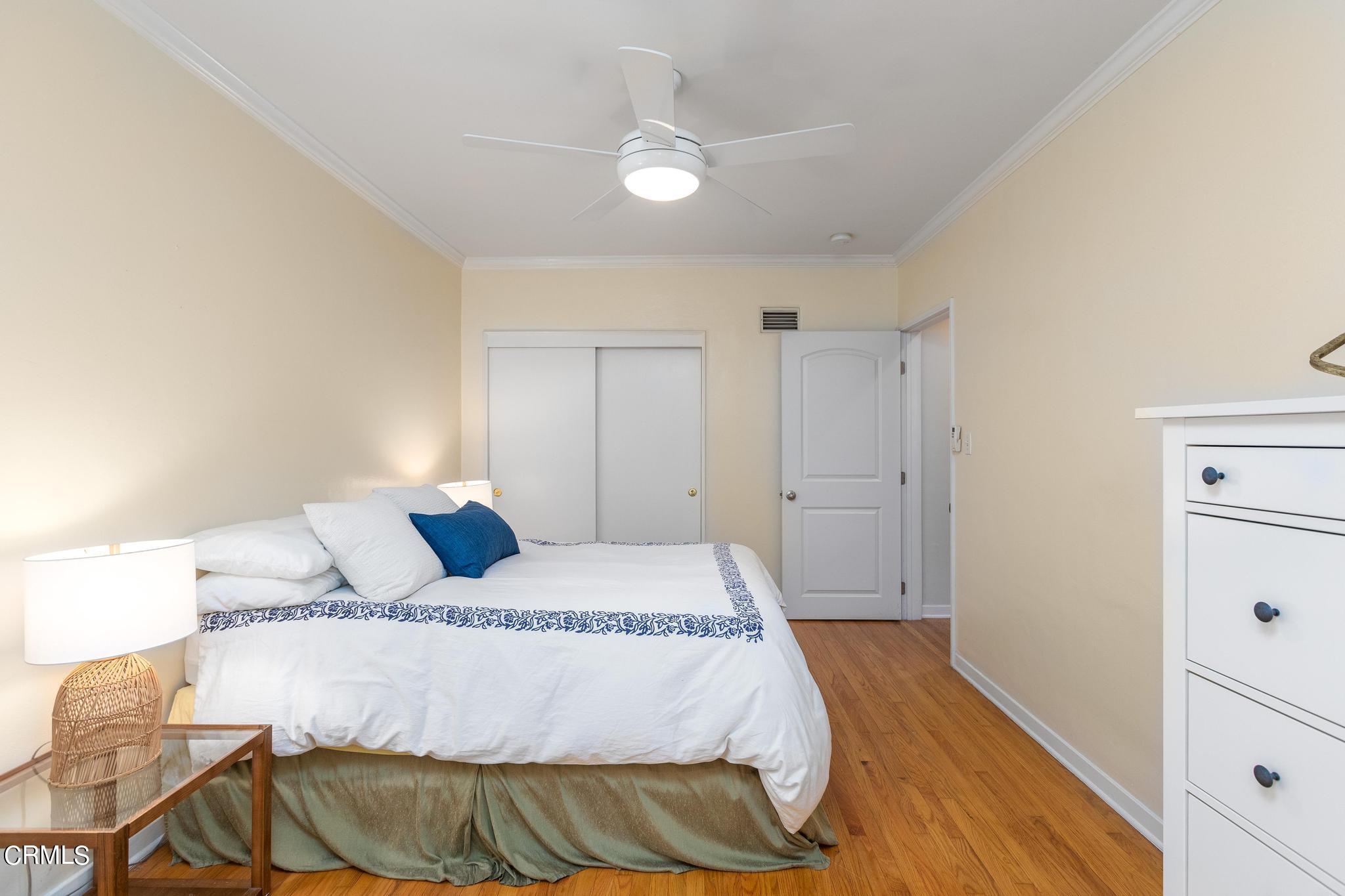 2399 Brigden Road Pasadena, CA 91104 - Photo 13 of 32 a bedroom with a bed and closet