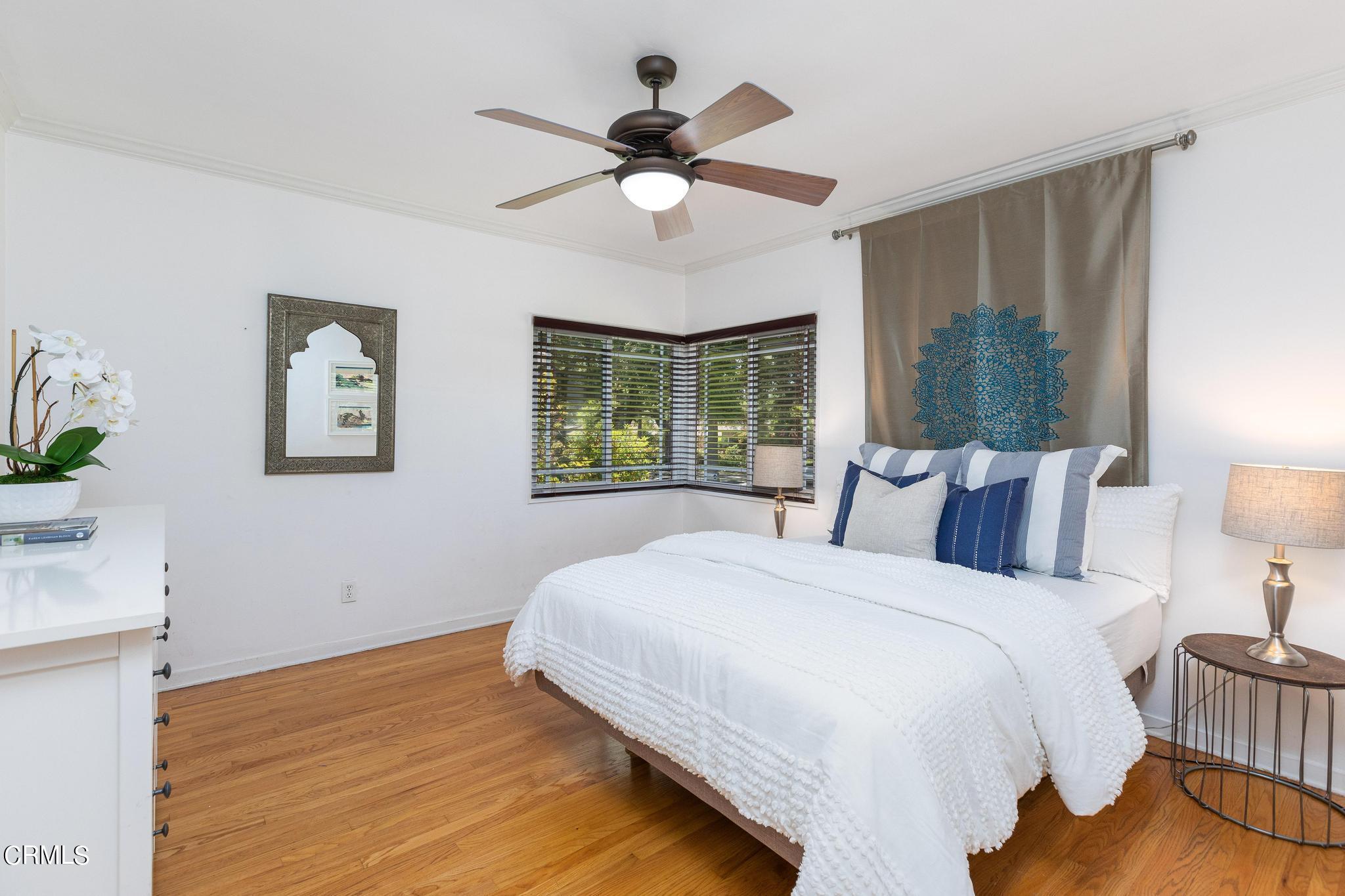 2399 Brigden Road Pasadena, CA 91104 - Photo 14 of 32 a bedroom with a bed and a window