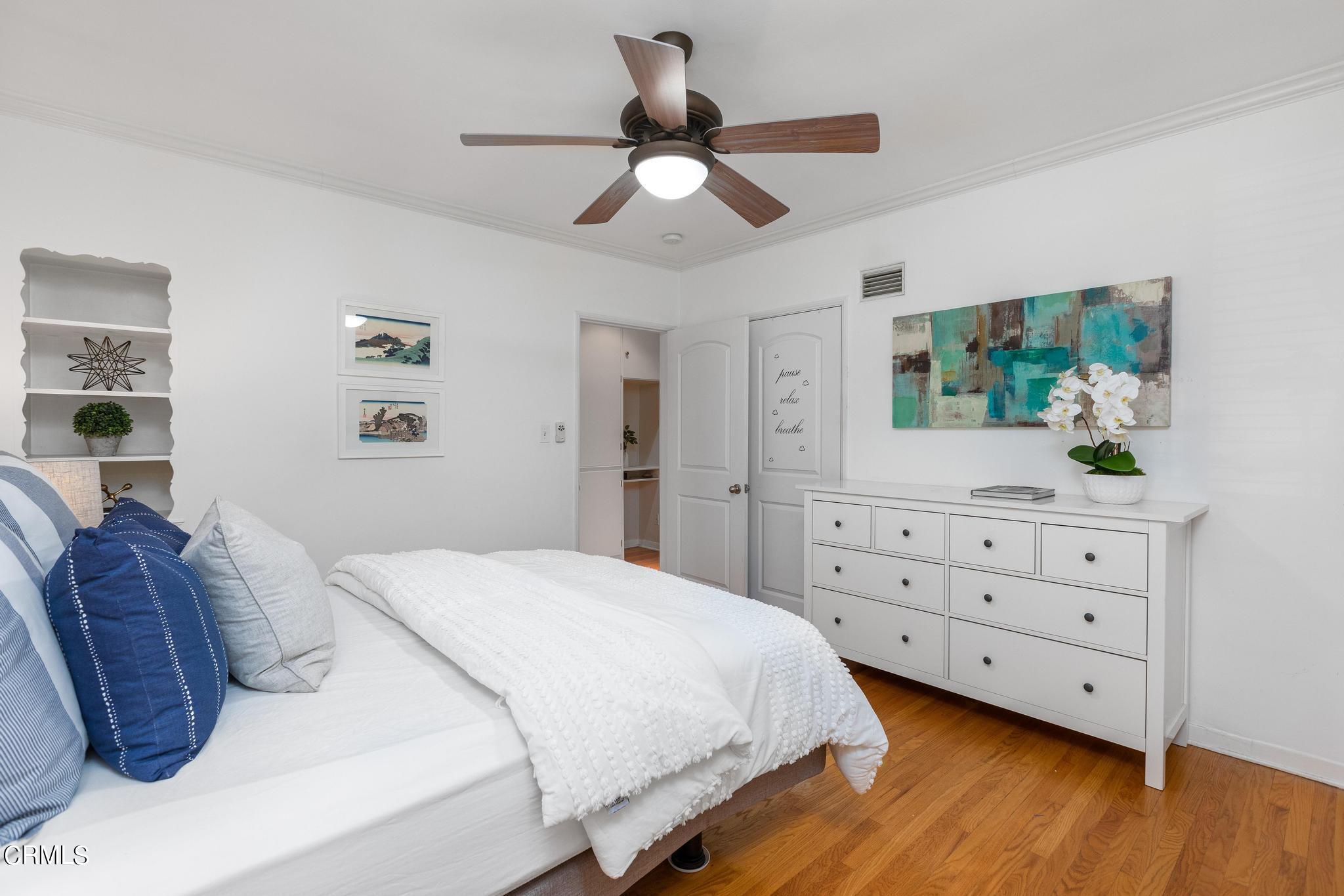 2399 Brigden Road Pasadena, CA 91104 - Photo 15 of 32 a bedroom with a bed and a dresser