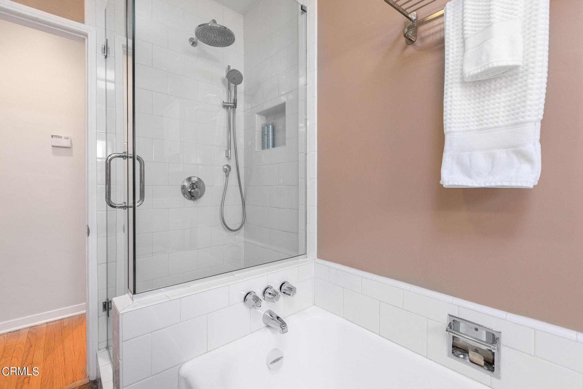 2399 Brigden Road Pasadena, CA 91104 - Photo 21 of 32 a bathroom with a bathtub and shower