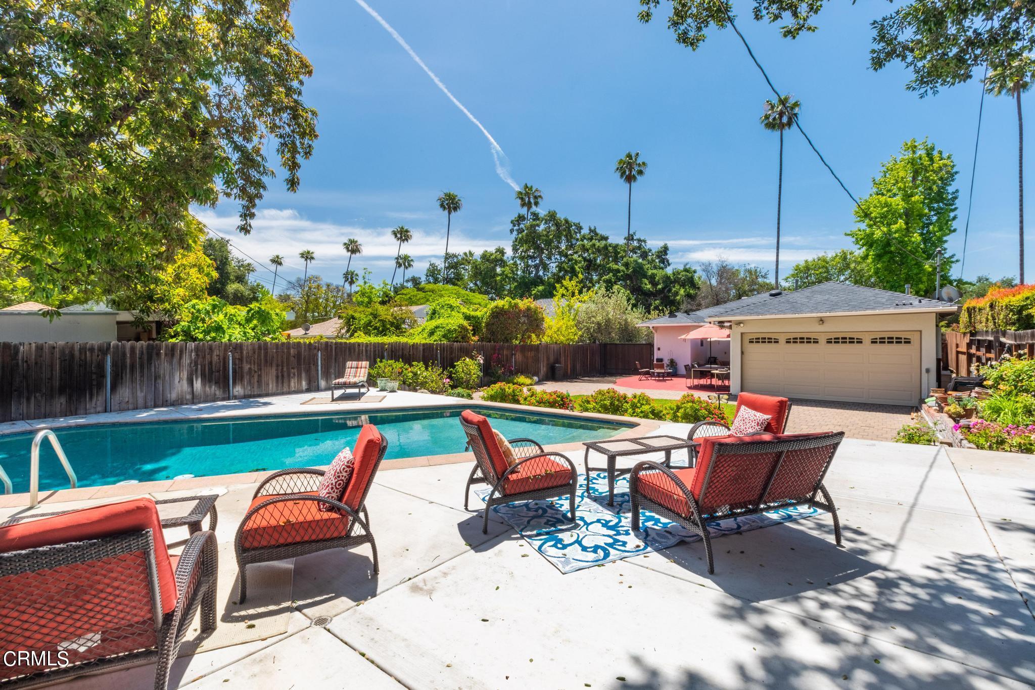 2399 Brigden Road Pasadena, CA 91104 - Photo 27 of 32 a view of backyard with outdoor seating a patio and plants