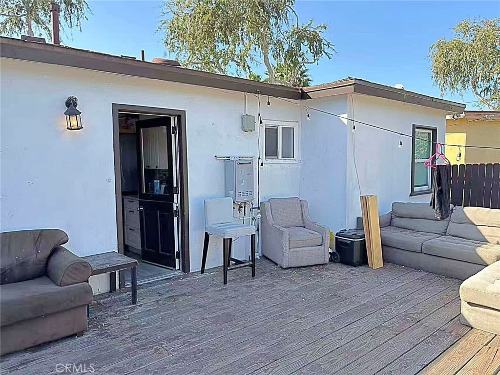 1105 East Walnut Avenue Fullerton, CA 92831 - Photo 11 of 22 a living room with furniture and a wooden floor