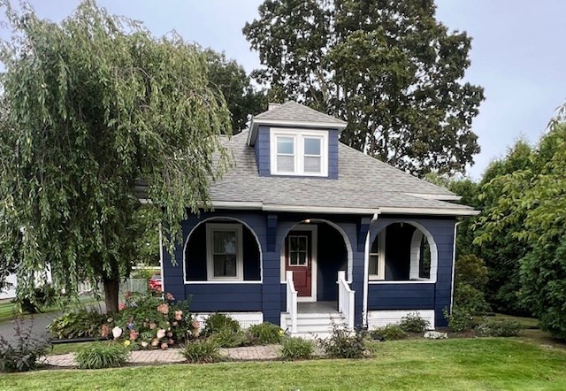 228 Piper Road West Springfield, MA 01089 - Photo 1 of 18 a front view of a house with garden