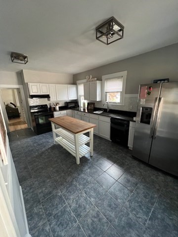 228 Piper Road West Springfield, MA 01089 - Photo 3 of 18 a kitchen with granite countertop a sink stainless steel appliances and cabinets