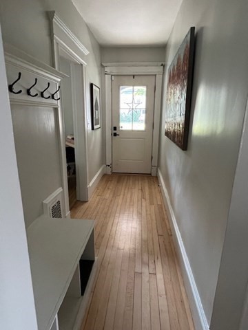 228 Piper Road West Springfield, MA 01089 - Photo 7 of 18 a view of a hallway view with wooden floor and staircase