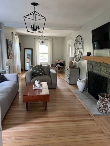 228 Piper Road West Springfield, MA 01089 - Photo 8 of 18 a living room with furniture fireplace and flat screen tv