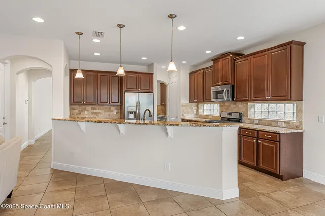 $735,000 | 8551 Strom Park Drive, Melbourne, FL 32940