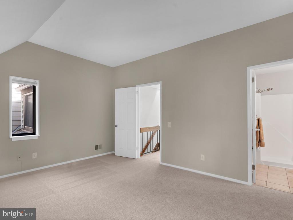 1502 Scandia Circle Reston, VA 20190 - Photo 21 of 42 Master Bedroom with vaulted ceiling