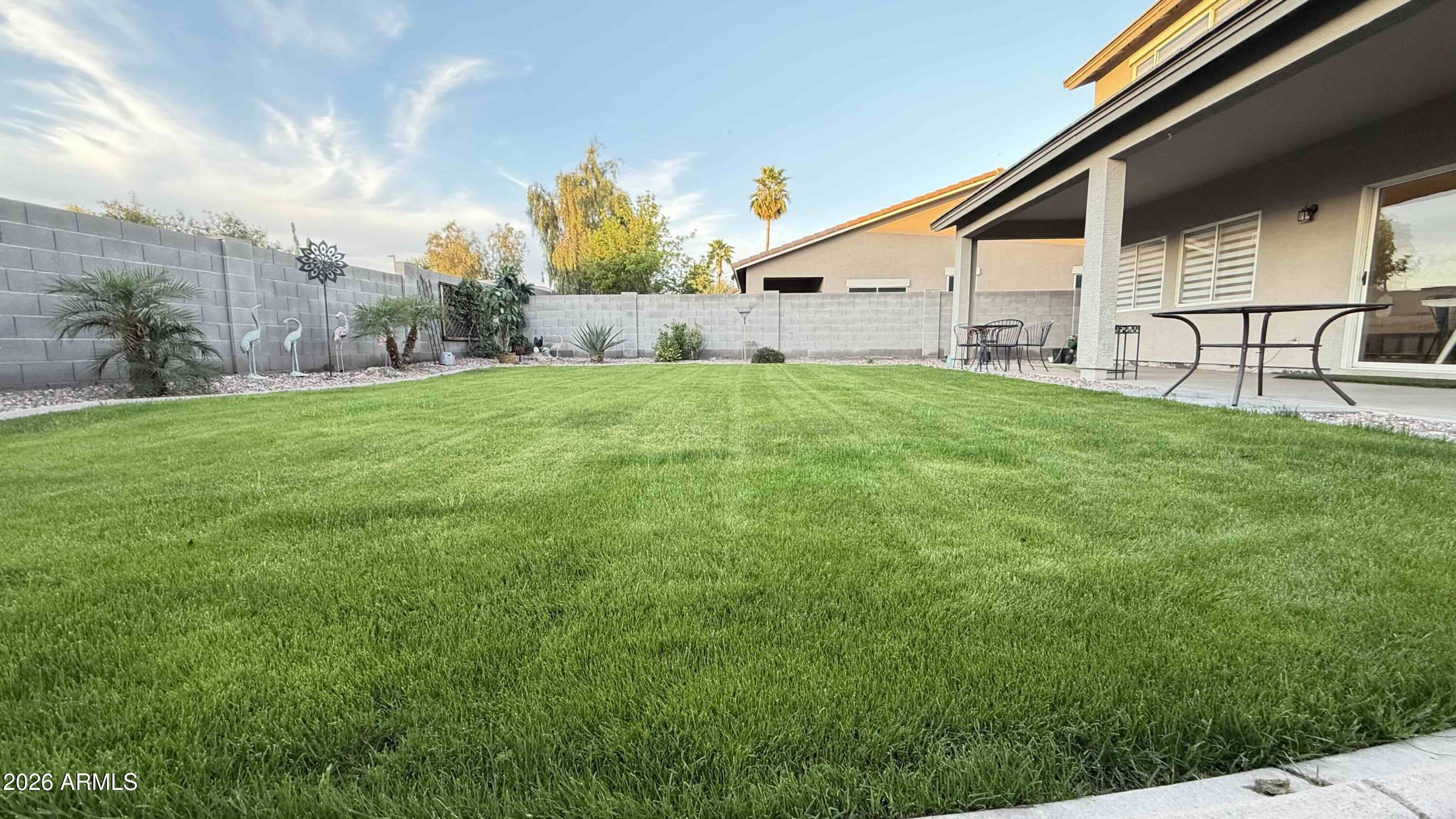 3632 South Loback Lane Gilbert, AZ 85297 - Photo 34 of 46 back grass