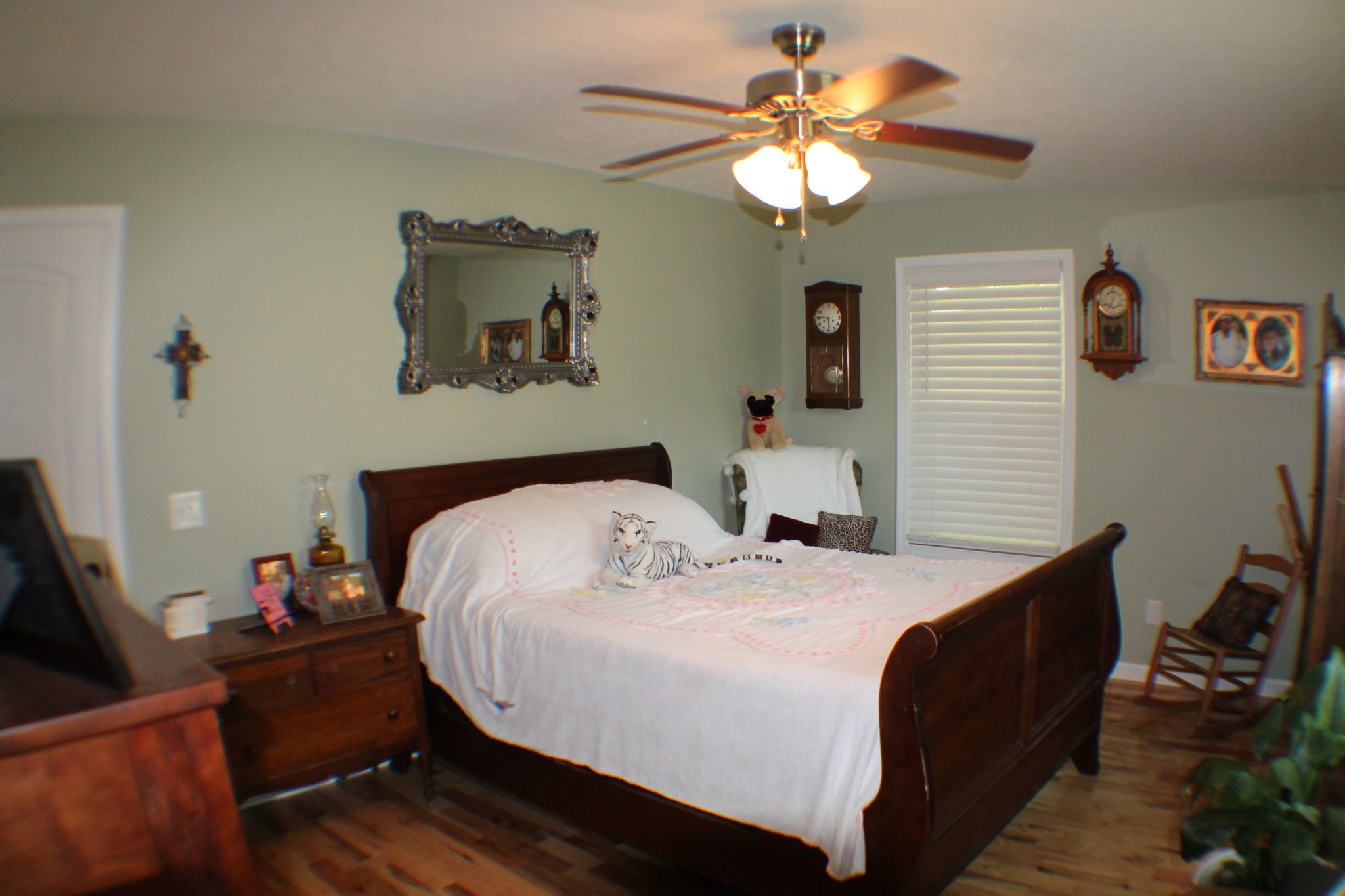 985 Archer Road Lafayette, TN 37083 - Photo 11 of 26 a bedroom with a bed and a chandelier