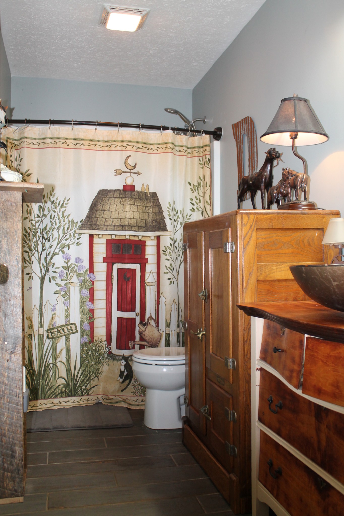 985 Archer Road Lafayette, TN 37083 - Photo 12 of 26 a bathroom with a toilet a sink and mirror
