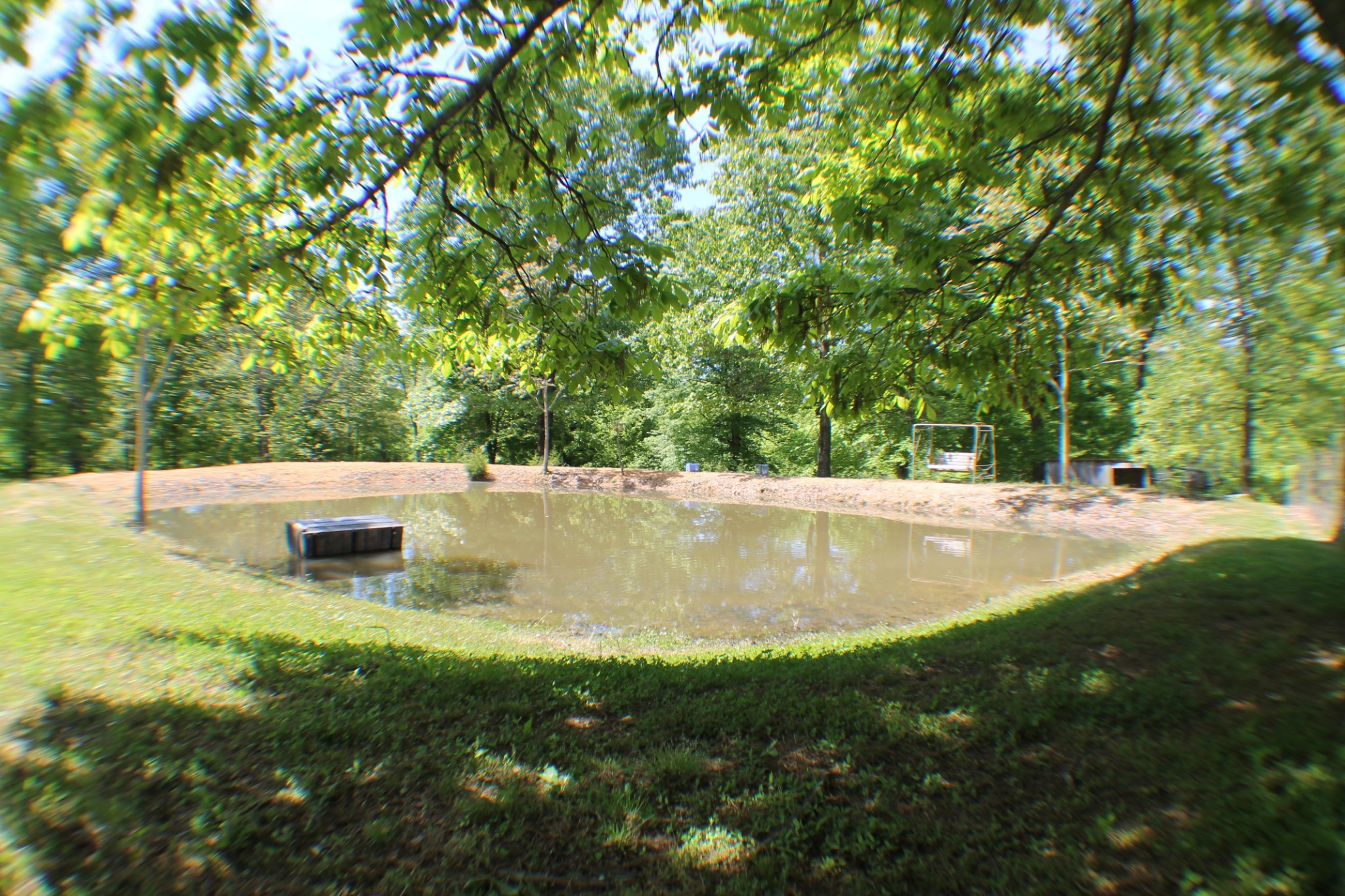 985 Archer Road Lafayette, TN 37083 - Photo 20 of 26 a view of a garden with a bench