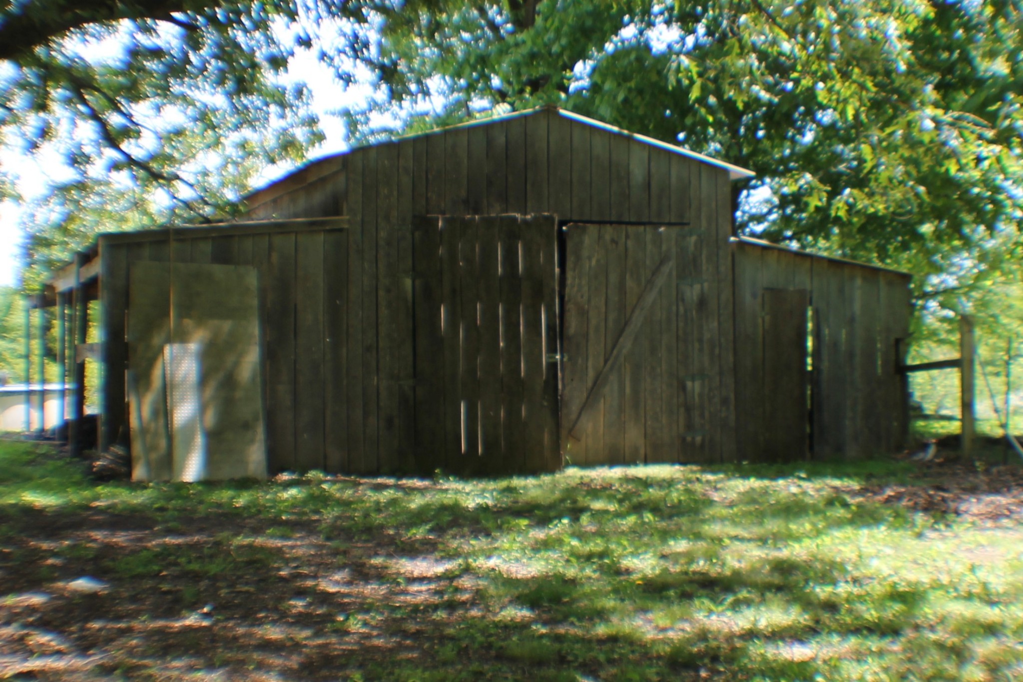985 Archer Road Lafayette, TN 37083 - Photo 23 of 26 a backyard of a house with lots of green space