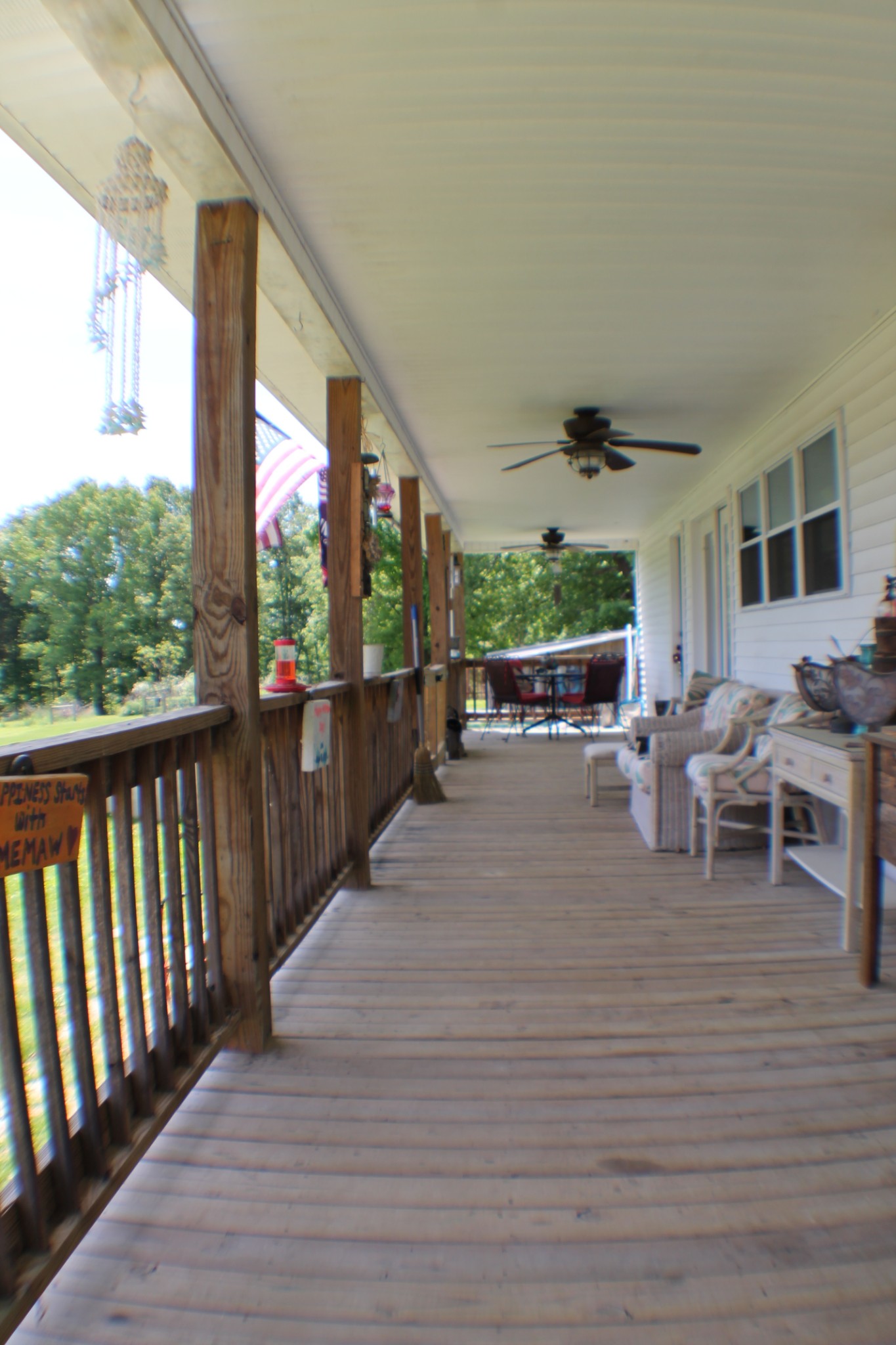 985 Archer Road Lafayette, TN 37083 - Photo 4 of 26 a view of a porch with wooden floor