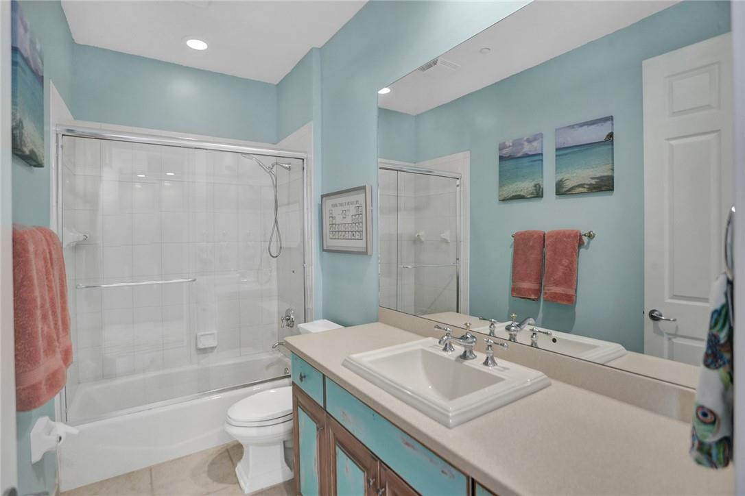 2820 Marina Circle Lighthouse Point, FL 33064 - Photo 20 of 37 a bathroom with a sink toilet tub and shower