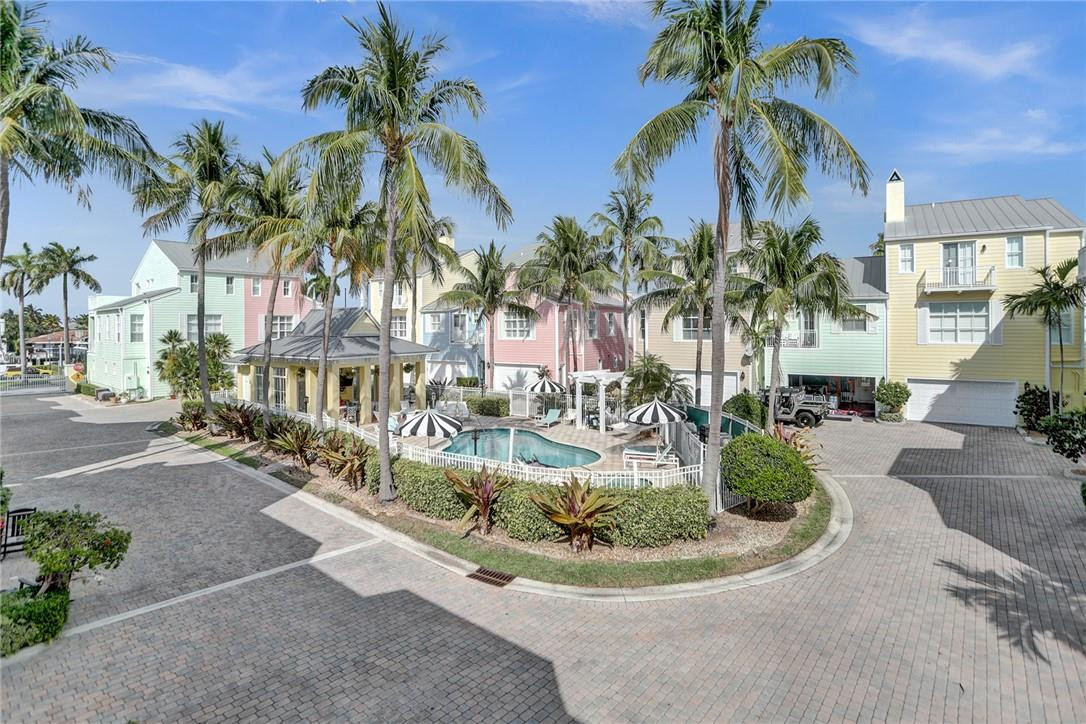 2820 Marina Circle Lighthouse Point, FL 33064 - Photo 24 of 37 a view of a palm tree with water fall